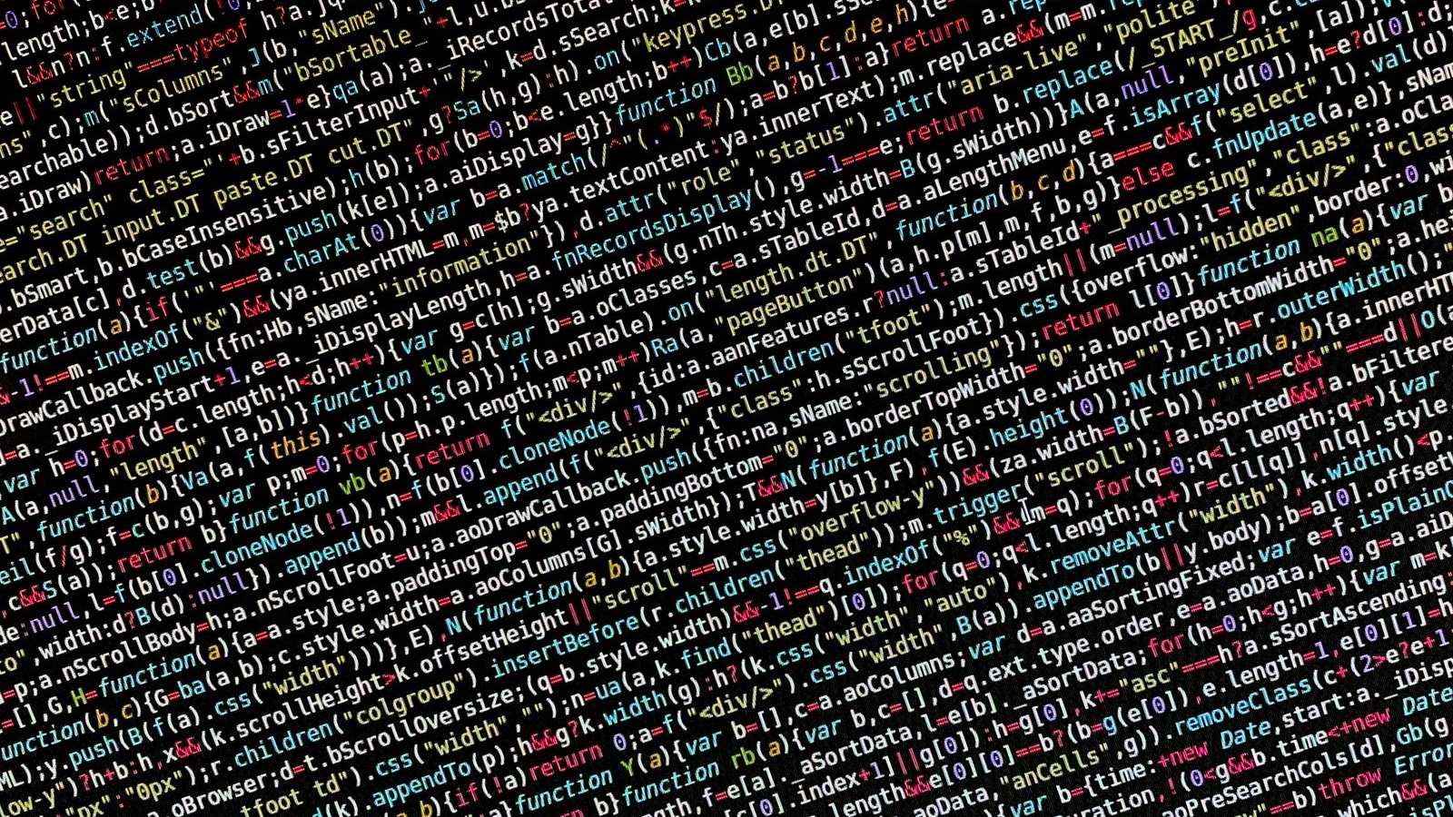 Software project handover: What belongs with the source code? A close-up of software source code displayed on a screen
